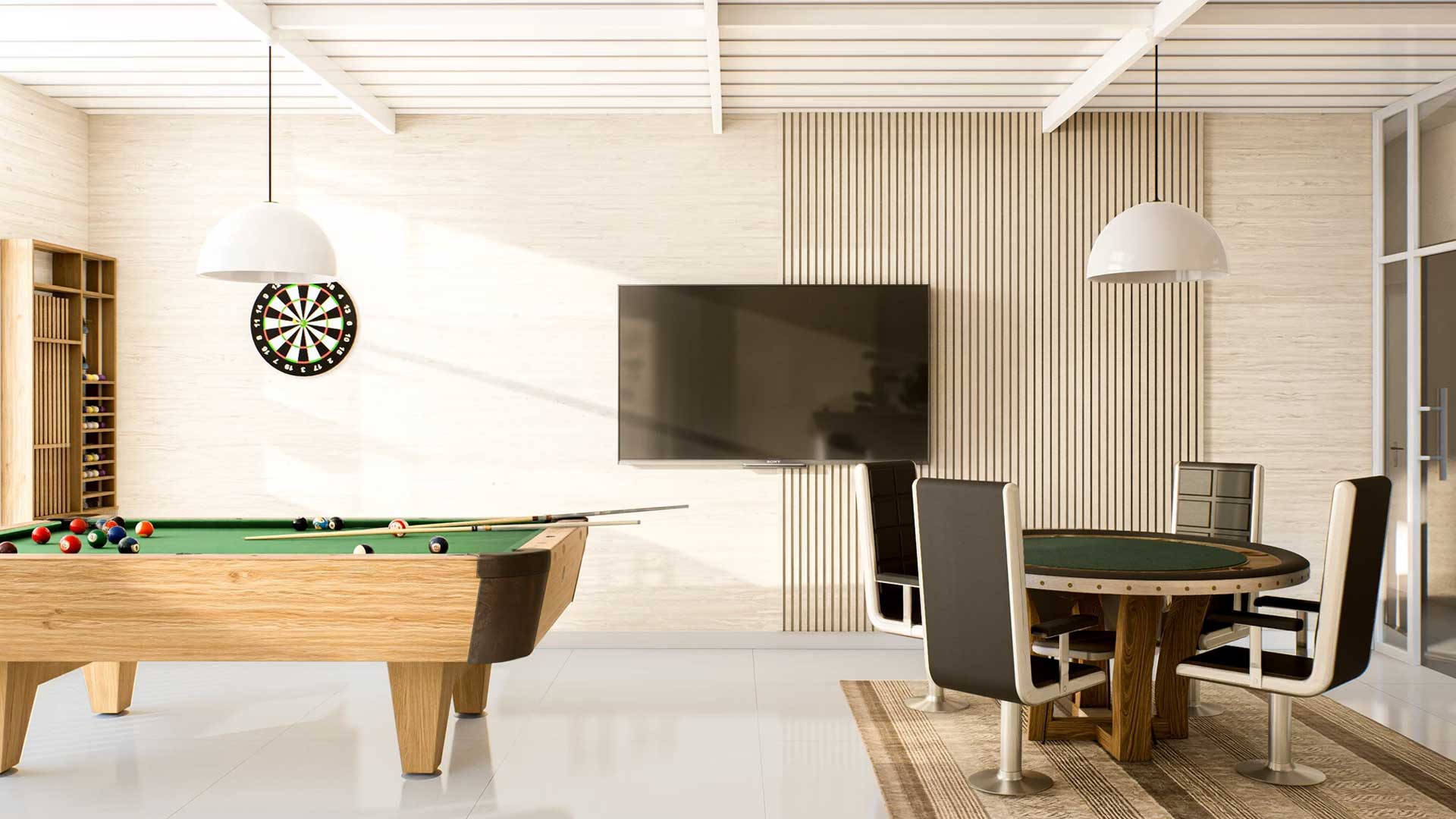 Sala de juegos con mesa de billar y área social